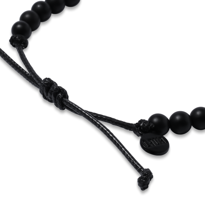 6mm Black Matte Onyx Adjustable Pull Bracelet (side view) - The LAVA Cō